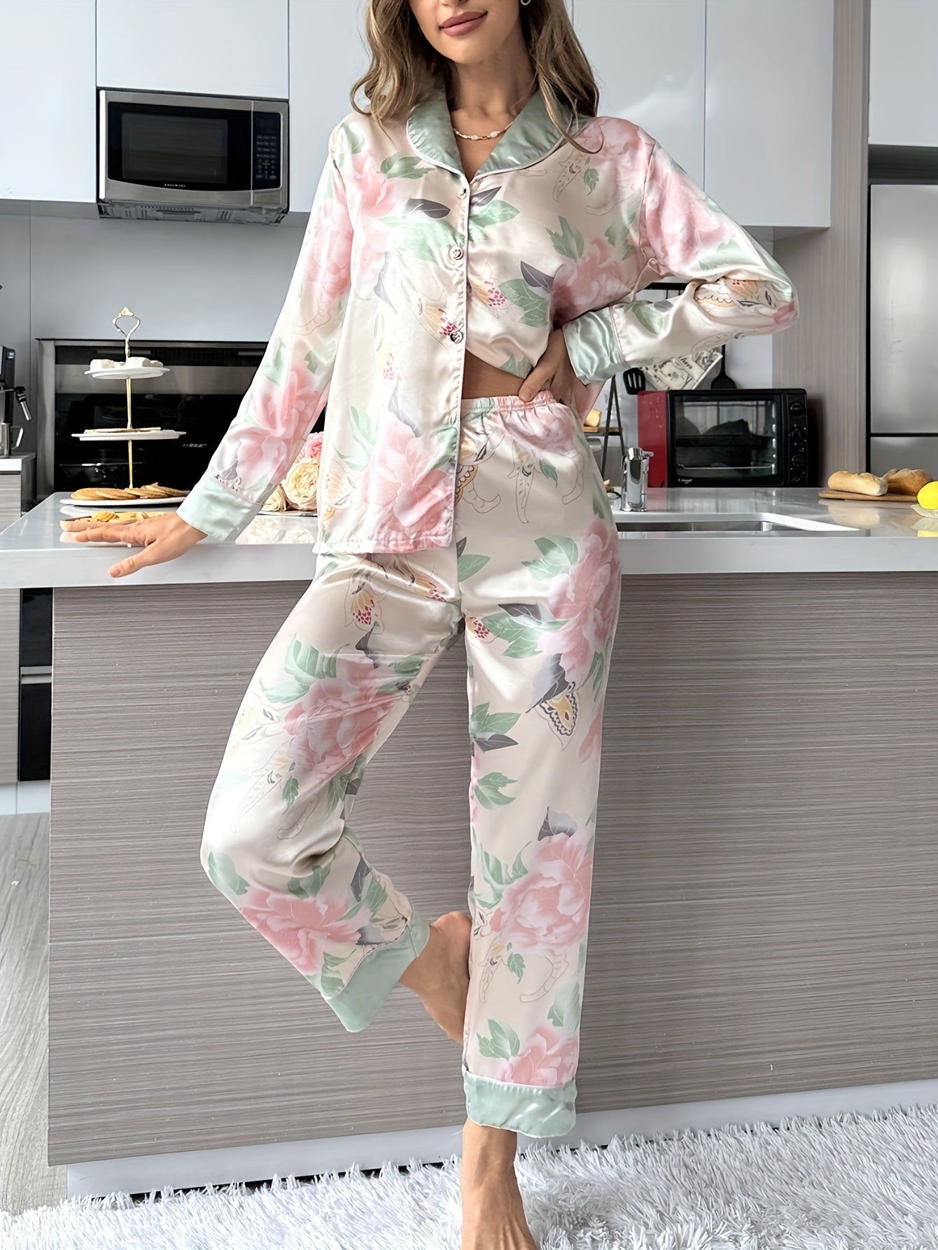 Women's soft satin pajama set with elegant floral print, long sleeve top and pants, perfect for indoor and outdoor wear.