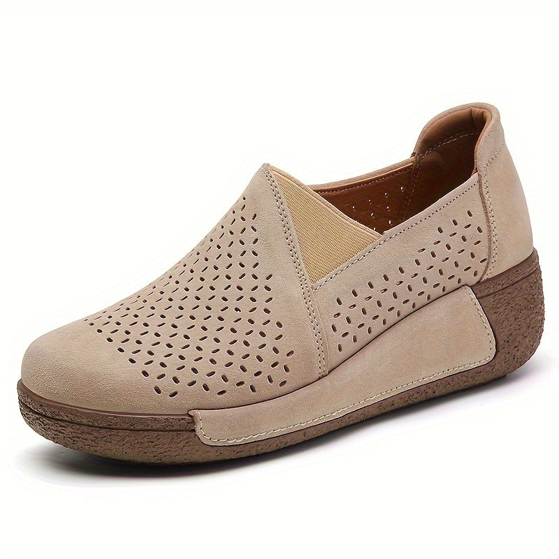 Breathable slip-on sneakers for women with hollow design, round toe, and non-slip PU sole.