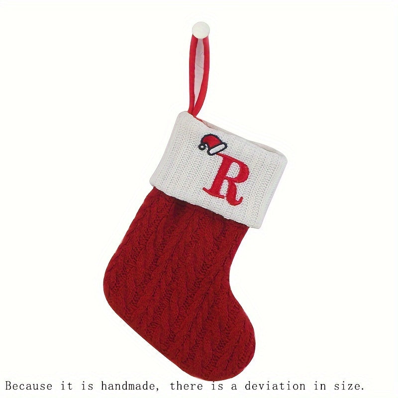 11" Christmas stocking with knitted alphabet design, perfect for hanging on the Xmas tree or using as a gift bag. Made of polyester.