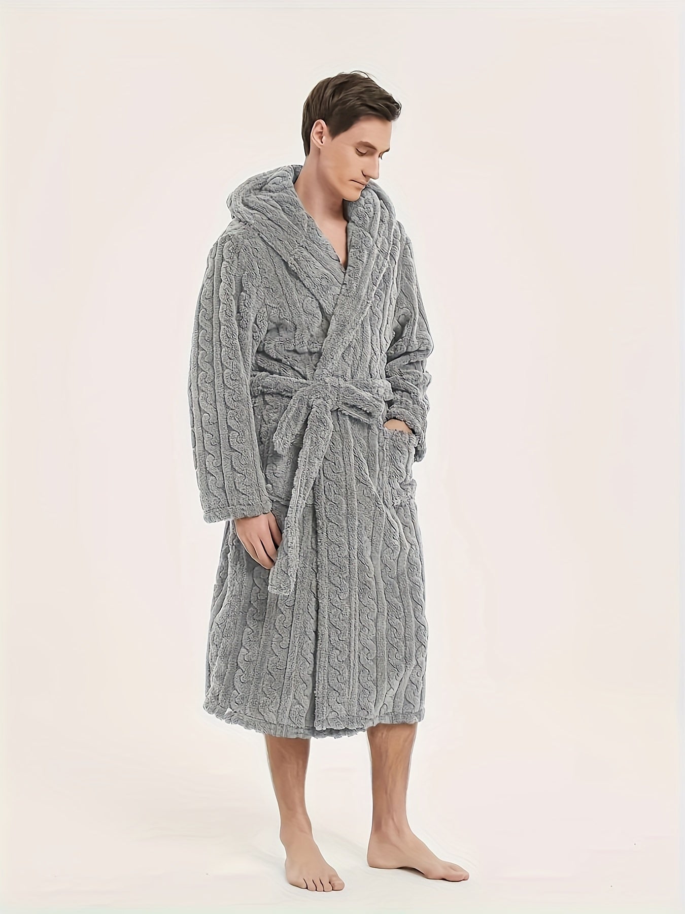 Men's fleece hooded robe for home and hotel use, with belt for comfort.