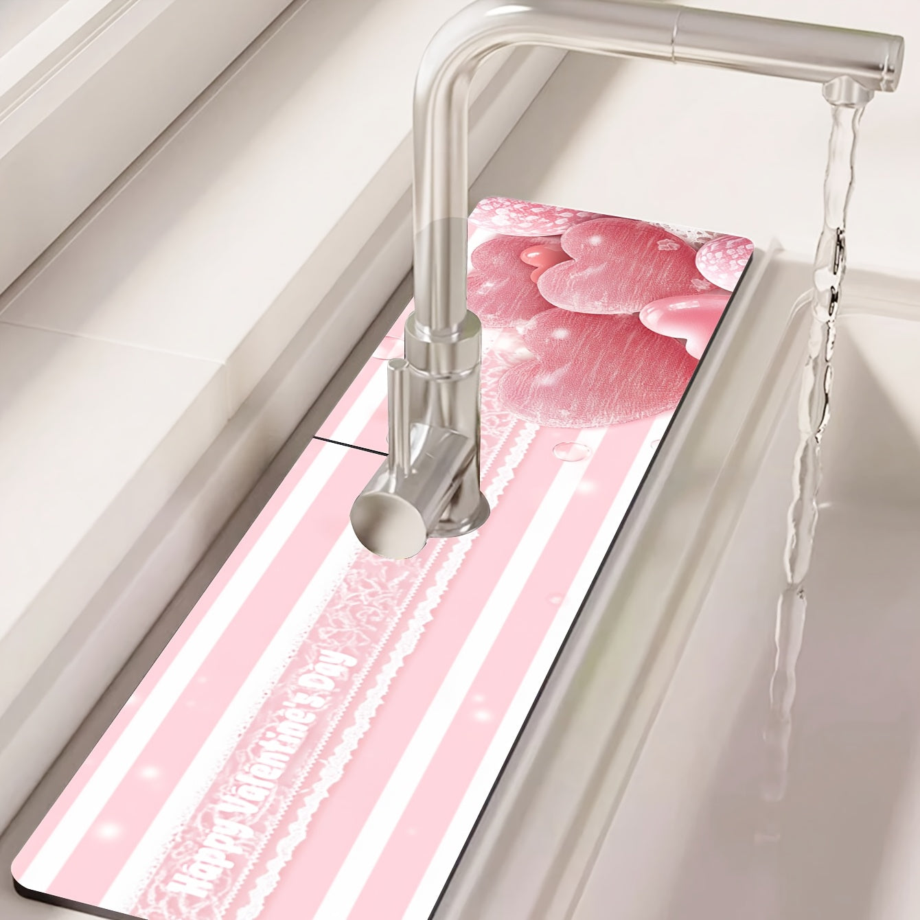 Pink Striped Love Faucet Mat - Perfect for Valentine's Day! Made from durable polyester, this moisture-proof and absorbent drain pad is ideal for use in the kitchen or bathroom. Features a diatom mud suction cup design for extra grip.