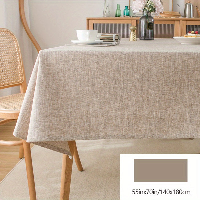 Beige rectangular polyester tablecloth for picnics or holiday gatherings with simple style, ideal for home dining decor.