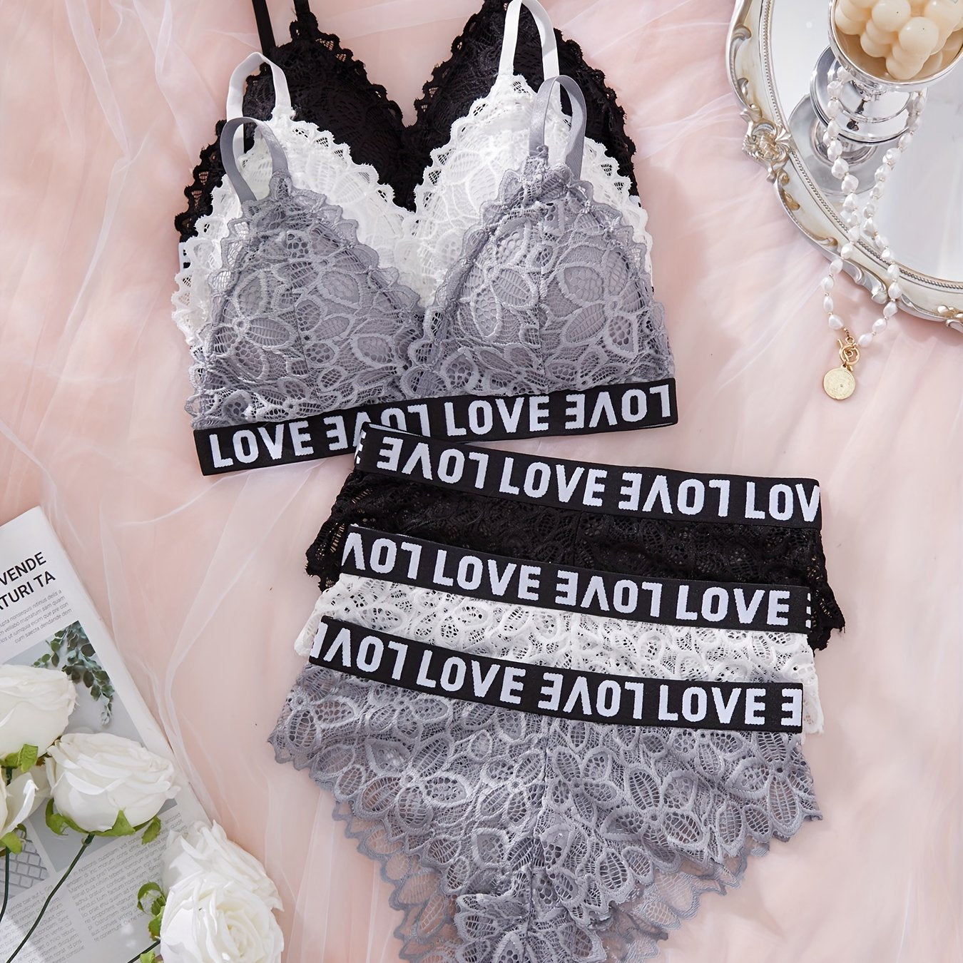 6-piece lace lingerie set for women featuring sporty and sexy wireless bra and panties with "LOVE" waistband. Made with breathable black and white floral lace for a comfortable fit.