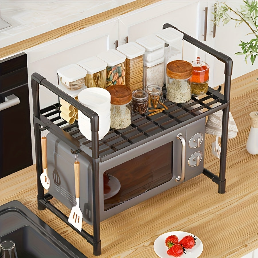 Modern Korean-style kitchen storage rack features open shelving and is multi-functional, perfect for organizing dishes and seasonings. Made of plastic, this microwave oven stand requires no assembly and saves space.