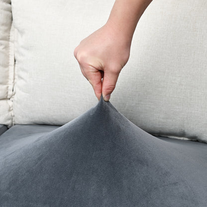 Velvet sofa slipcover for home decor protection and style.