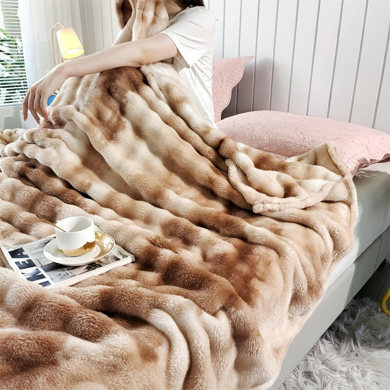 Modern soft faux rabbit fur bed blanket with a tie-dye plush flannel design, featuring a thick dual layer for ultimate coziness in all seasons. Made of machine washable polyester in a rainbow moire pattern, perfect for the sofa, living room, or bed.