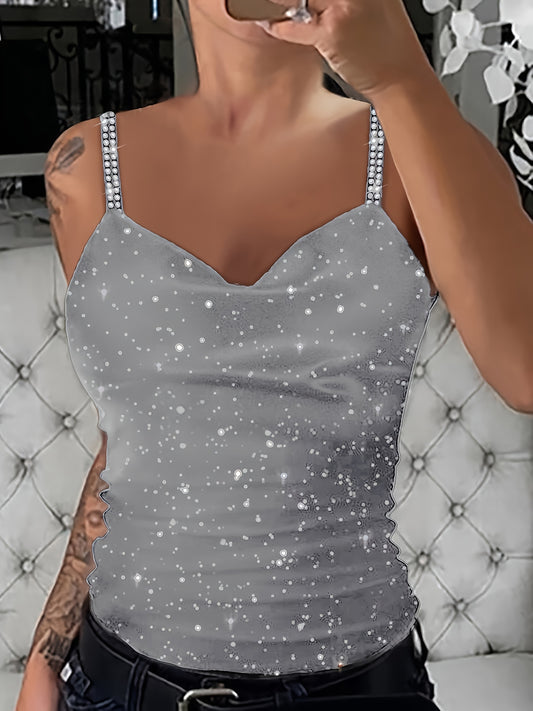 Sleek black sequin cami with rhinestone straps. V-neck, sleeveless, machine washable polyester knit. Stylish and sexy summer top.