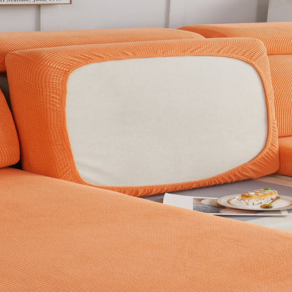 Durable sofa cover protects furniture from spills and stains.