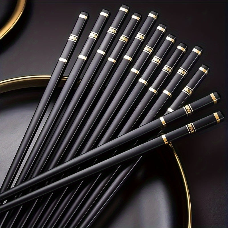 5 pairs of reusable alloy chopsticks with embossed Great Wall pattern, perfect for fast food, noodles, sushi, and ramen. Luxurious and stylish.