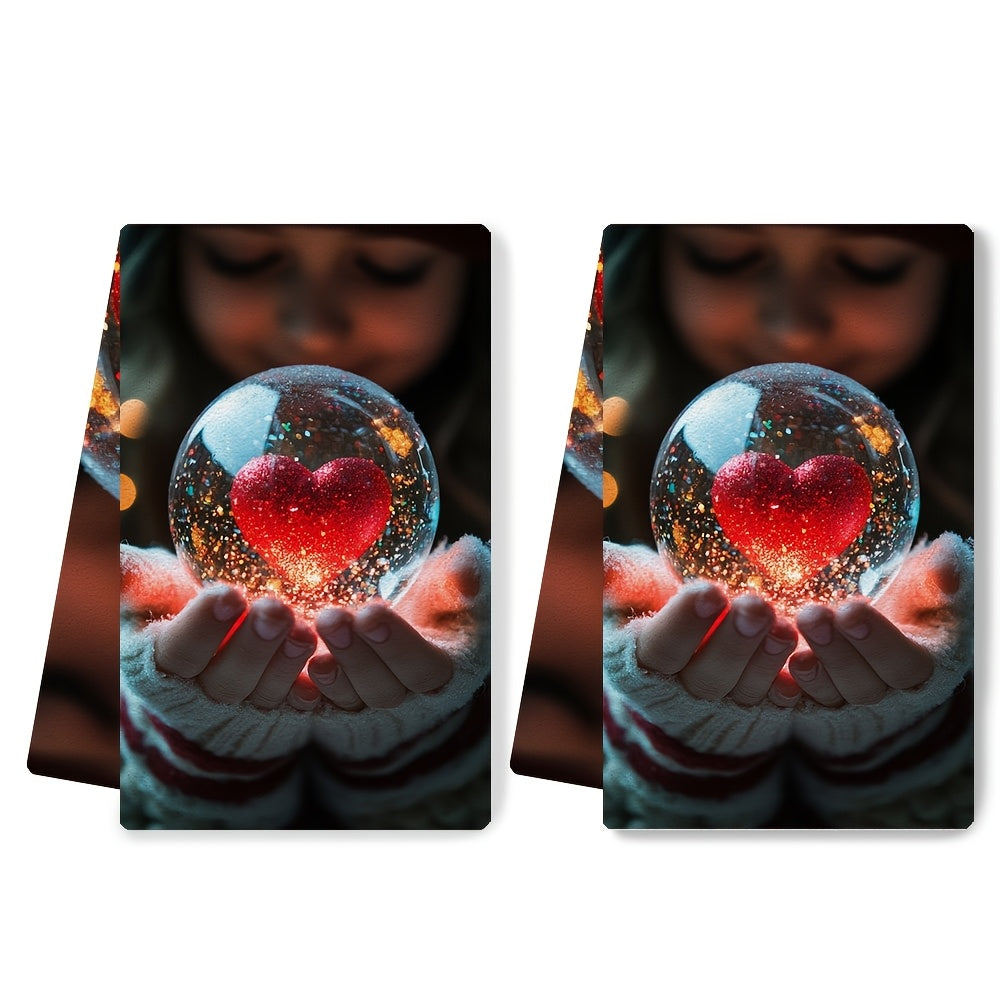 This bundle includes 2 ultra-soft kitchen towels adorned with a charming image of a girl delicately shaking a heart-shaped snow globe. These dish towels are highly absorbent, perfect for adding a festive touch to your holiday decor. They are machine