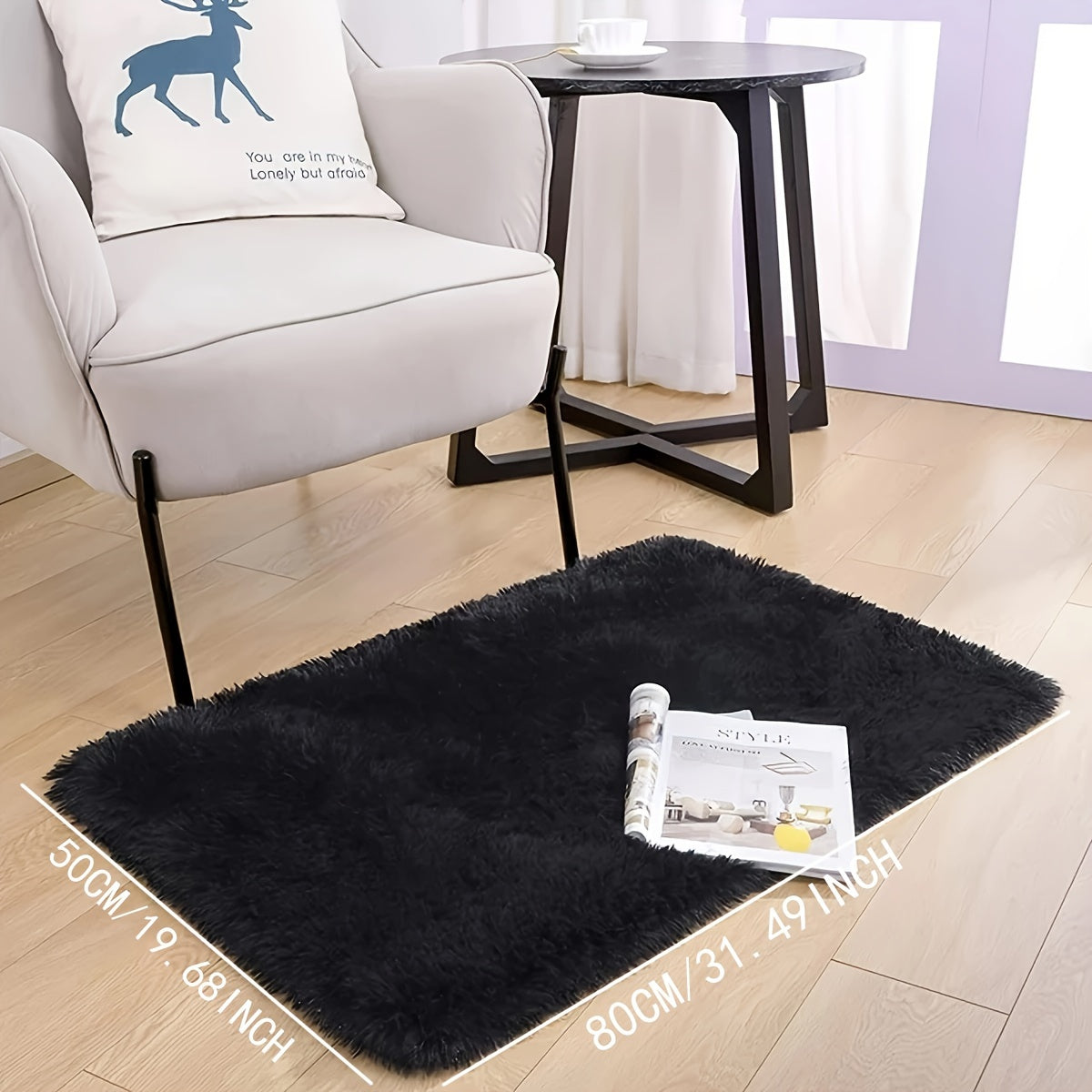 One piece of a shaggy rug, a fluffy floor mat, a simple plush area rug, a round soft area rug mat, a comfortable household carpet, perfect for your living room.