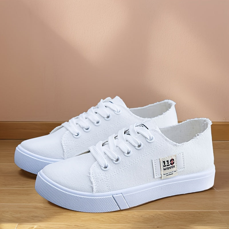 1 pair of women's casual canvas sneakers with round toe, lace-up design, lightweight rubber sole, and fabric insole.