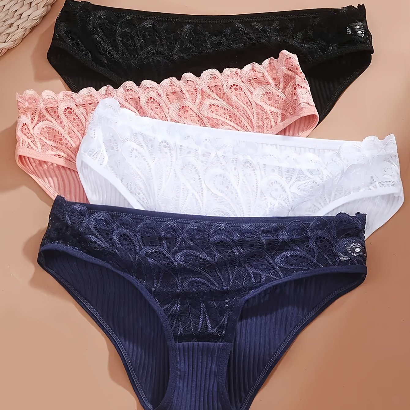 4-pack of lace trim briefs for women, made of comfortable breathable cotton.