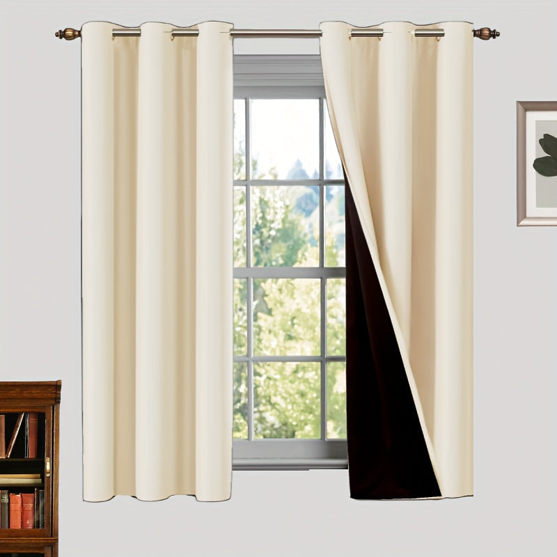 Two pieces of 100% blackout curtains made from polyester, coated and insulated with a grommet top design. Perfect for bedroom, living room, and home decor.