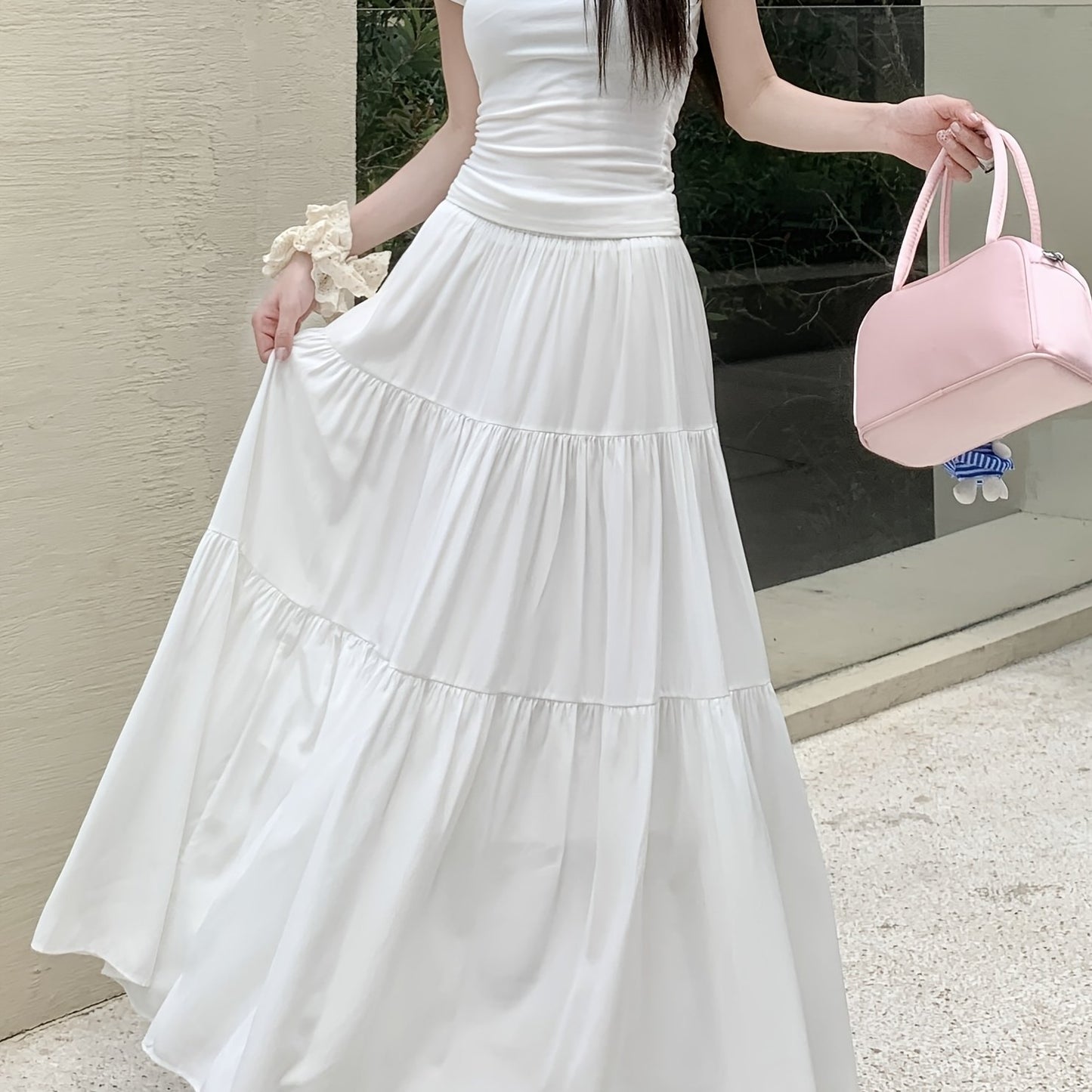 Women's elegant tiered A-line long skirt made of 100% polyester with lining, elastic high-waist, flared hem, loose fit, suitable for spring/summer/fall fashion.