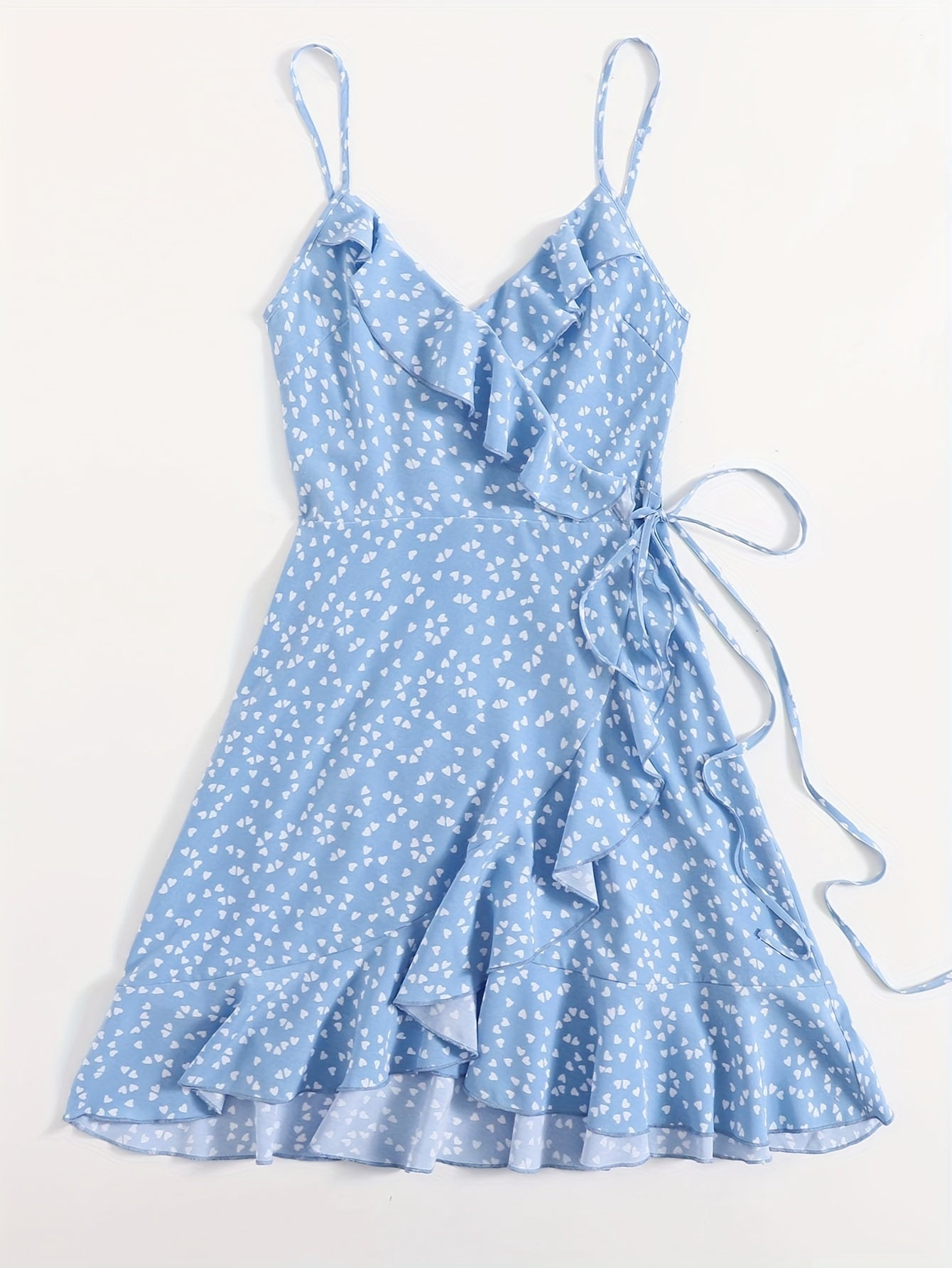 Heart print ruffle cami dress with lace-up detail, sleeveless V-neck design, perfect for spring and summer.