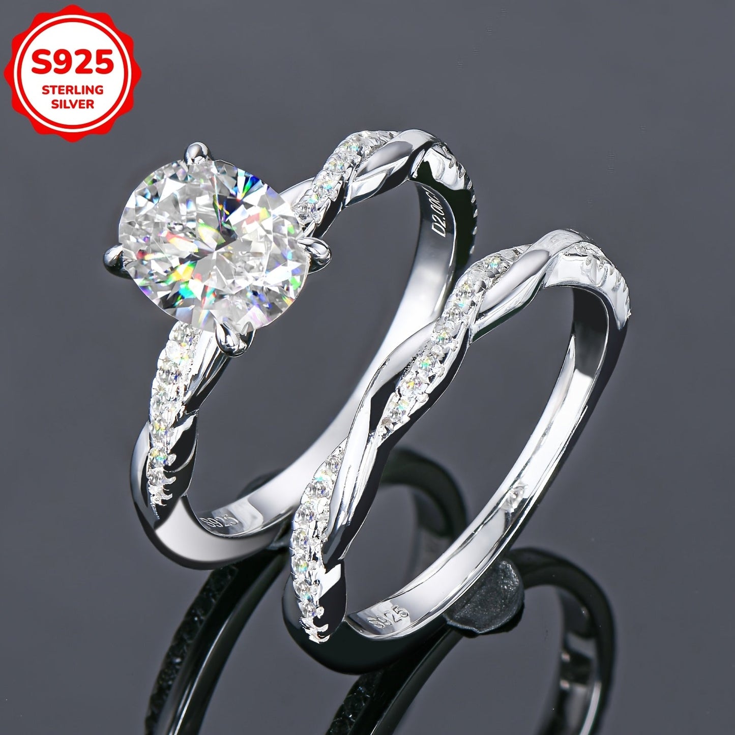 Weight: 5.48 grams, Main Stone: Oval 7x9mm Moissanite, Main Stone Weight: 2 carats, Set of 925 Pure Silver Women's Rings featuring a Moissanite main stone. The set includes a Moissanite Wedding Ring, Women's Wedding Ring, Engagement Ring with a twist arm