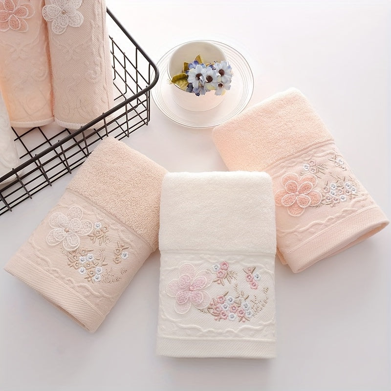 2 Cotton embroidered hand towels with quick-drying, absorbent material for home bathrooms.