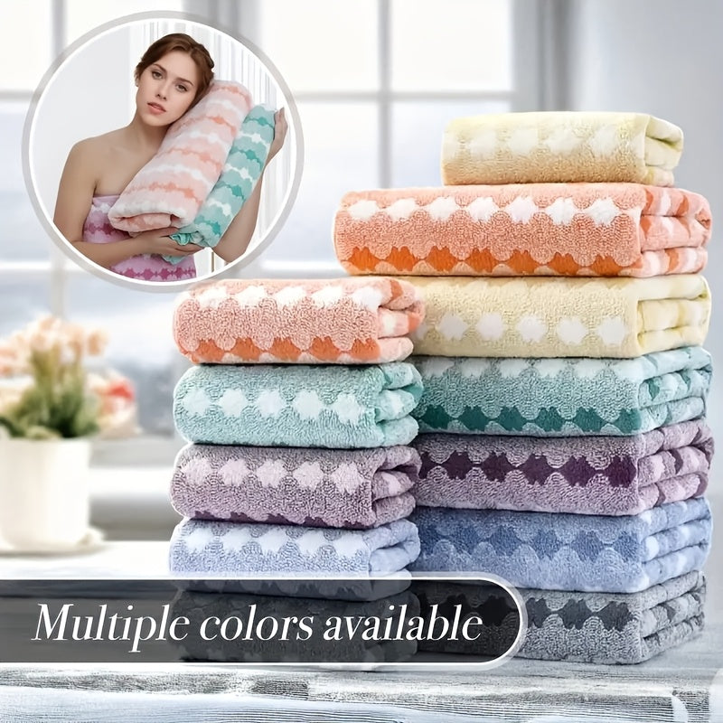 One set of extra large and small bath towels for women made of super soft, absorbent coral velvet with a modern design and strong absorbency.