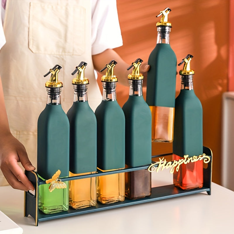 Set of elegant glass olive oil dispenser bottles, perfect for the kitchen. They are leakproof and must be hand washed. The set includes BPS-free square glass bottles with pourers, ideal for storing vinegar, soy sauce, and other seasonings. These bottles