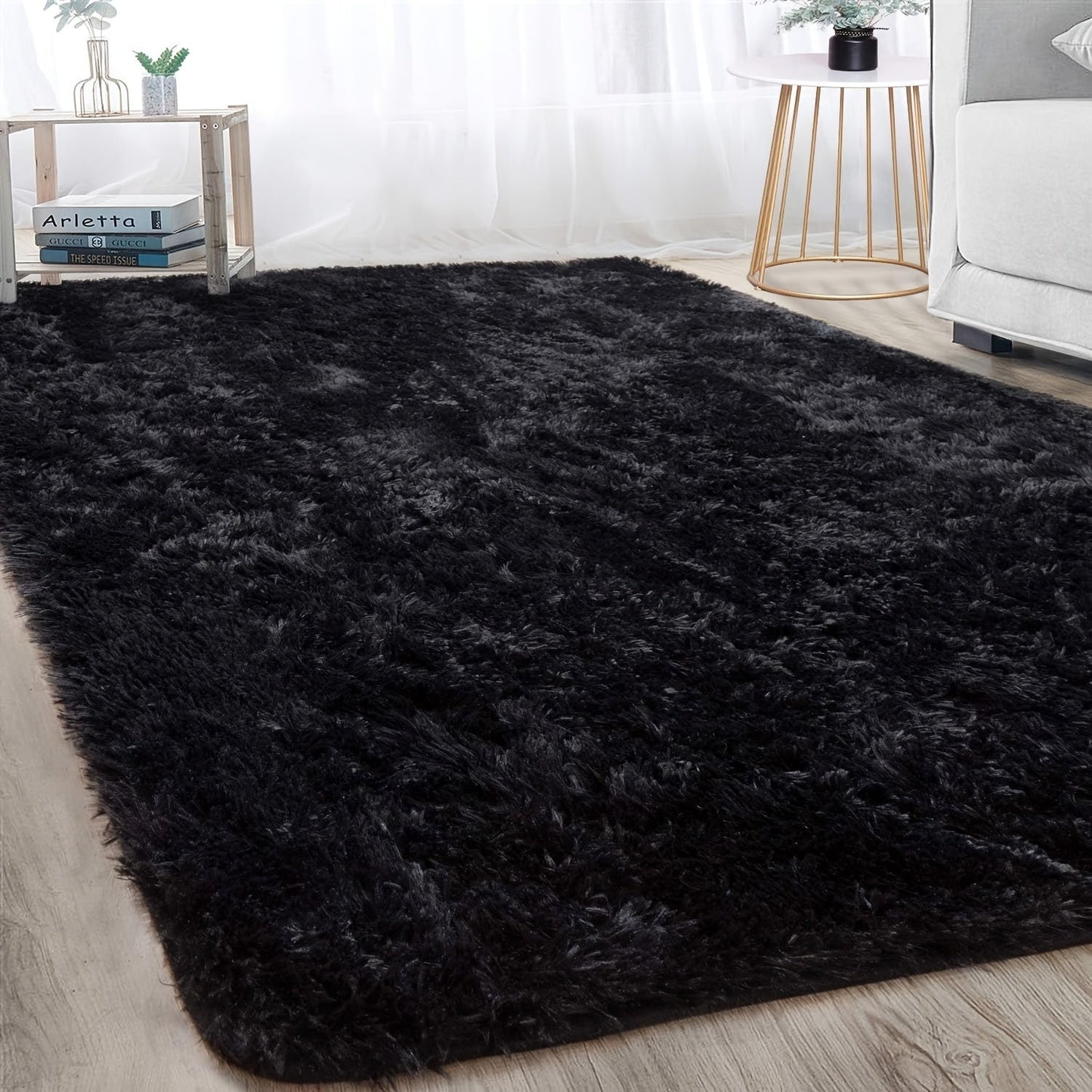 1 piece of Fluffy Black Shag Area Rug, made with extra soft and shaggy materials. Perfect for adding a cozy touch to your bedroom, living room, or outdoor space. Great for home decor.