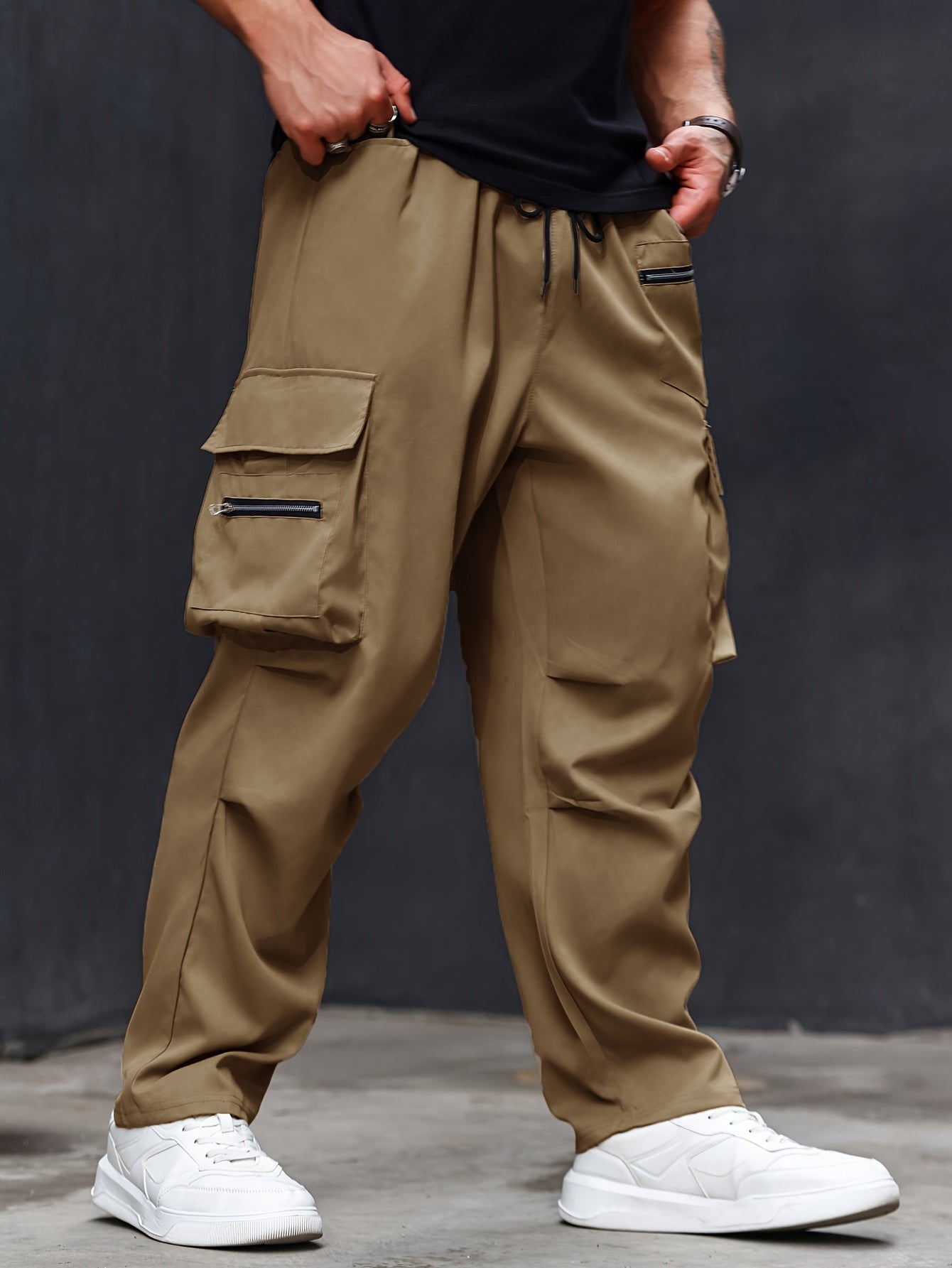 Plus size men's cargo pants with athletic and casual style, regular fit and pockets.