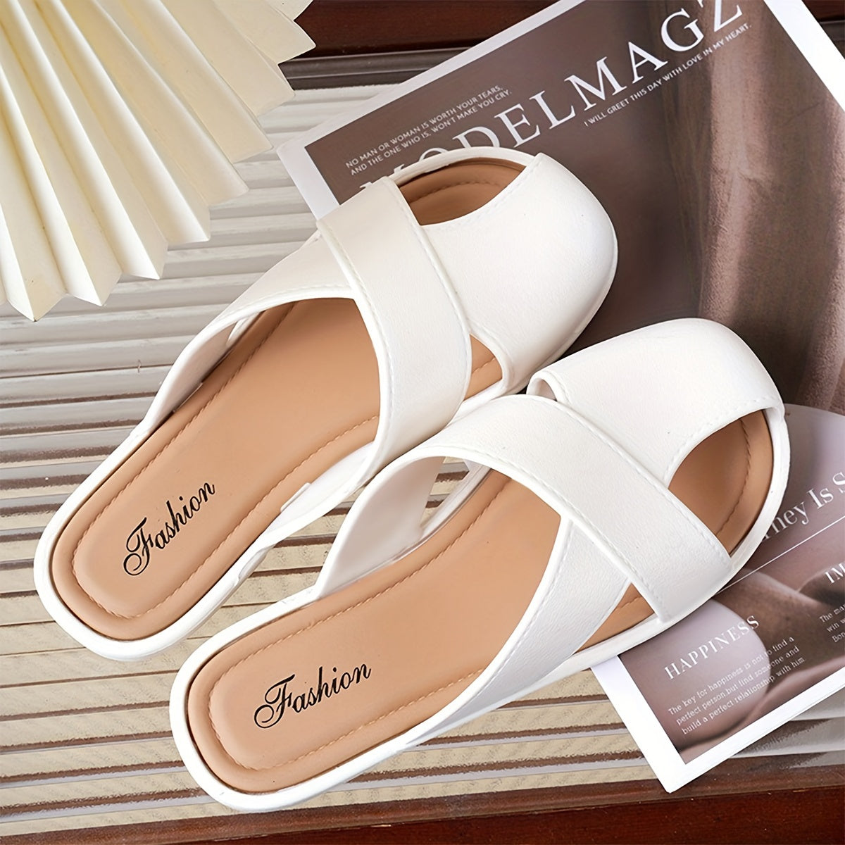 Stylish women's sandals with cross strap design, breathable PVC cover, flat heel. Available in white, beige, black. Perfect for vacations.