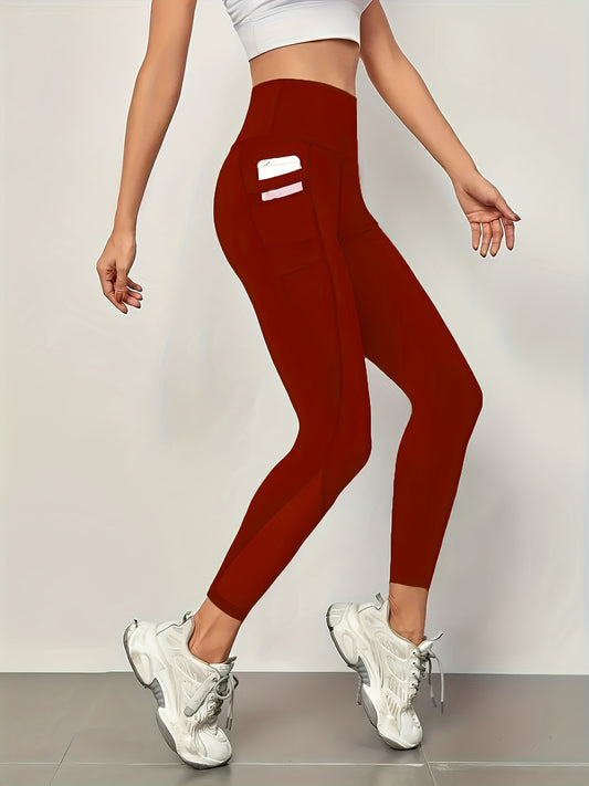 Mesh stitching yoga leggings for fitness and gym sports with high waist and side pockets.