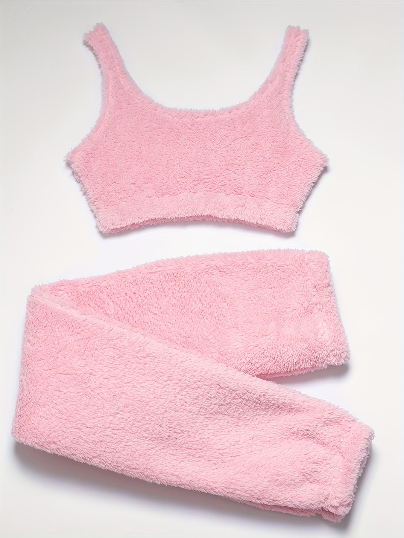 Cozy loungewear set for women: fuzzy tank top and elastic waistband pants.