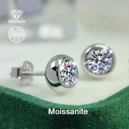 These dazzling 925 silver stud earrings feature a 1 carat white moissanite, perfect for adding a touch of light luxury to any outfit. Versatile and suitable for daily wear, these earrings make a perfect gift for Valentine's Day, Christmas, Halloween, New