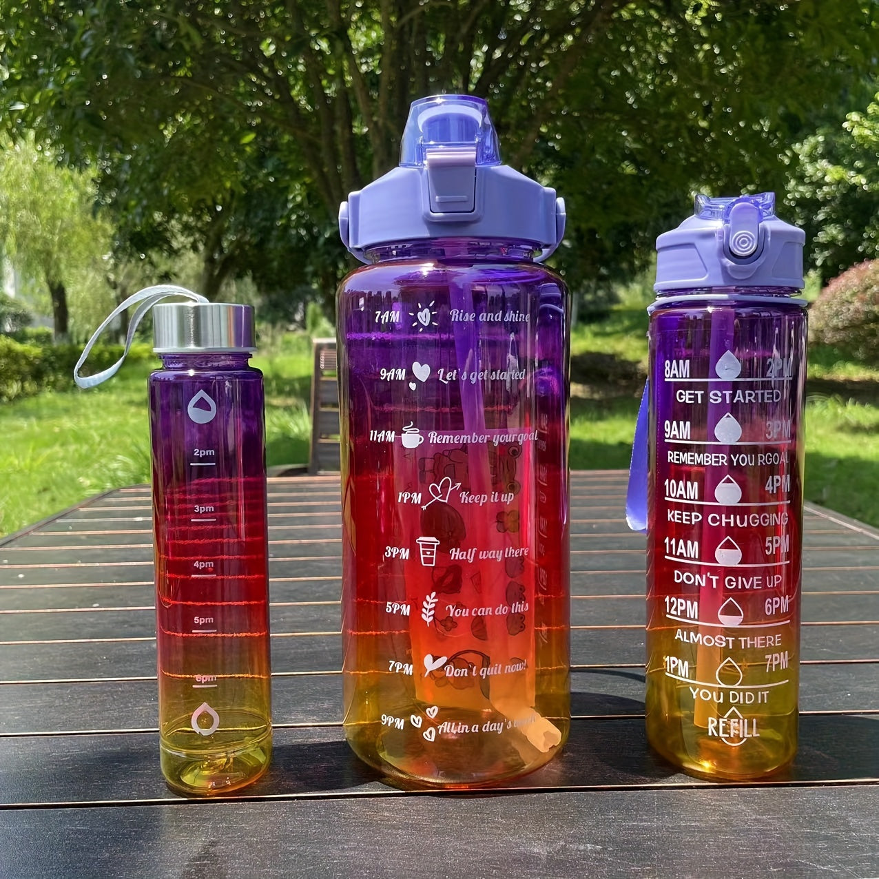 Set of 3 gradient color motivational water bottles (64oz, 32oz, 15oz) with mobile phone holder, food grade material straw cup, 2 stickers. Perfect for home and outdoor use, ideal Christmas gift.