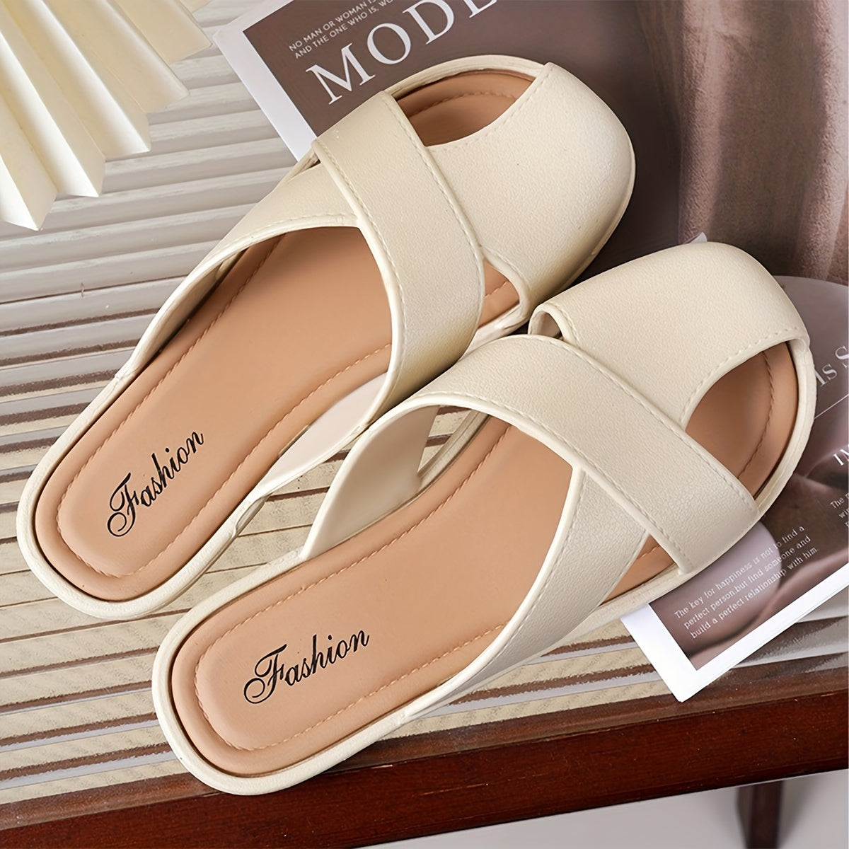 Stylish women's sandals with cross strap design, breathable PVC cover, flat heel. Available in white, beige, black. Perfect for vacations.