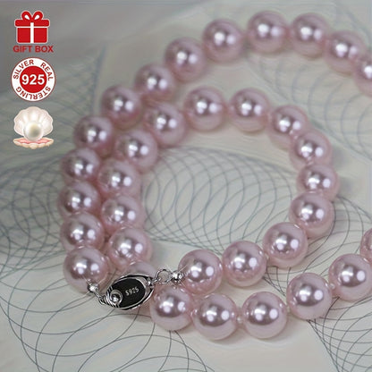 This stunning Cherry Blossom Pink Shell Pearl Necklace is crafted with hypoallergenic 925 Sterling Silver and features a vintage charm clasp. It makes the perfect gift for her and comes beautifully presented in an elegant gift box, making it ideal for