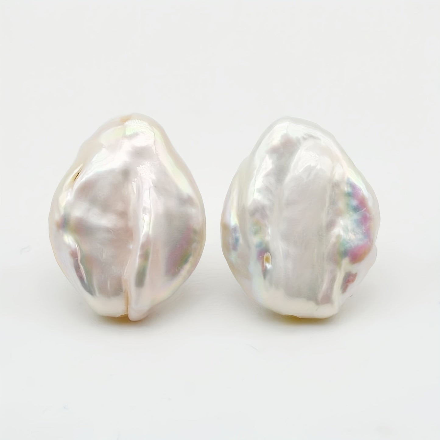 Baroque Pearl Earrings for Women by SAUDADE, featuring Natural Freshwater Pearls set in Silver Plated metal. These earrings boast a simple yet elegant style, making them the perfect gift for both daily wear and Mother's Day. With their timeless design