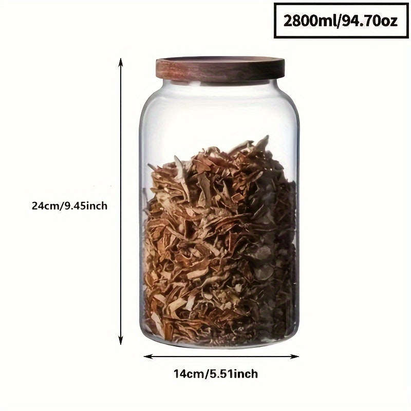 Large glass food storage jars with airtight wooden lids for storing coffee beans, dried food, pasta, tea leaves, overnight oats, grains, and spices. These clear glass canisters are perfect for organizing your kitchen and keeping your ingredients fresh.