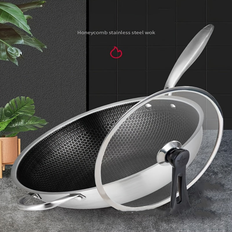 1-piece Stainless Steel Skillet with Lid featuring a thick honeycomb non-stick surface, perfect for cooking steak, eggs, and stir-fry dishes. This versatile pan is compatible with both induction and gas stoves, but should be hand washed for best results.