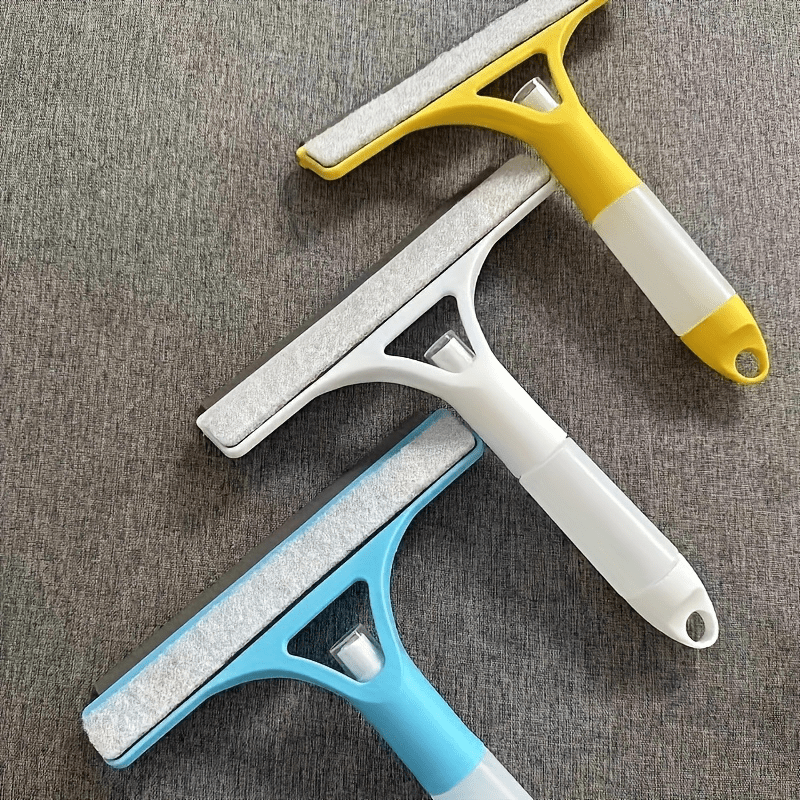 Professional home cleaning tool: Double-Sided Glass Scraper with Spray Bottle. Versatile window cleaning brush with silicon wiper. Suitable for windows, mirrors, floors, and cars.