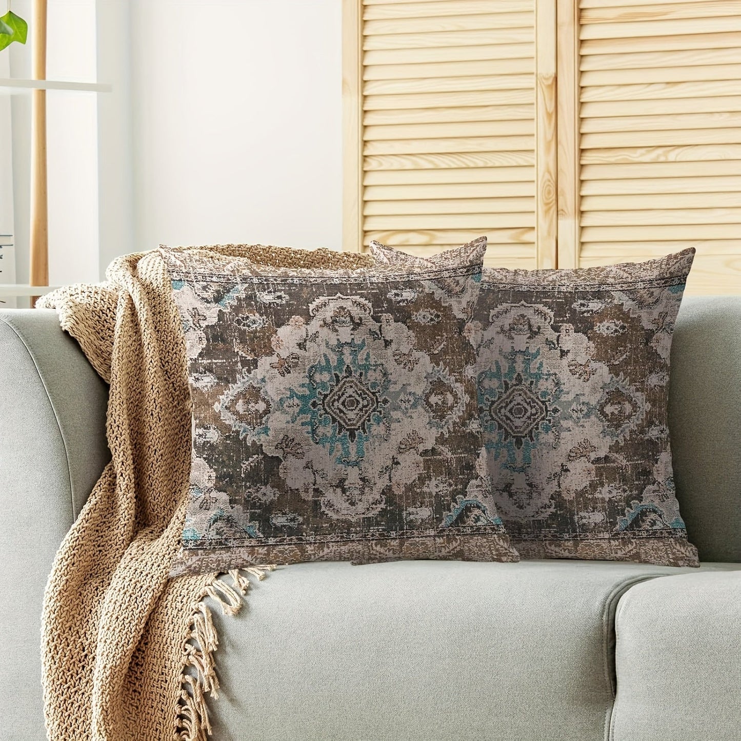 Pair of Boho Chic Linen Pillow Covers featuring a Brown & Blue Floral Design, with Zippered closures for easy removal. These Decorative Throw Pillow Cases are suitable for use on both sofas and beds, and are Machine Washable for easy maintenance.