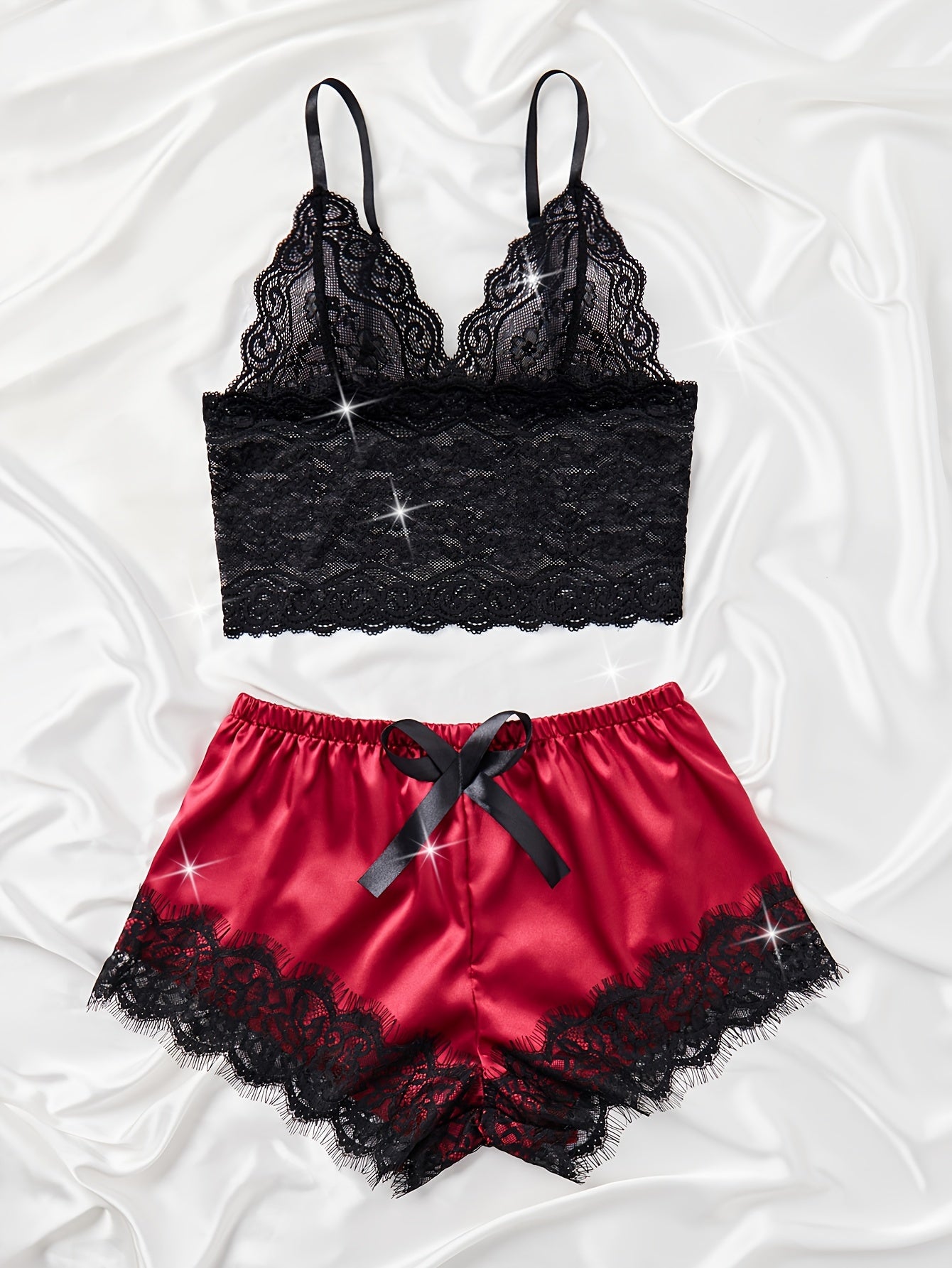 A Polyamide and elastane lingerie set with bow detail, solid color, and mid-rise trunks for medium support, suitable as adult nightwear.