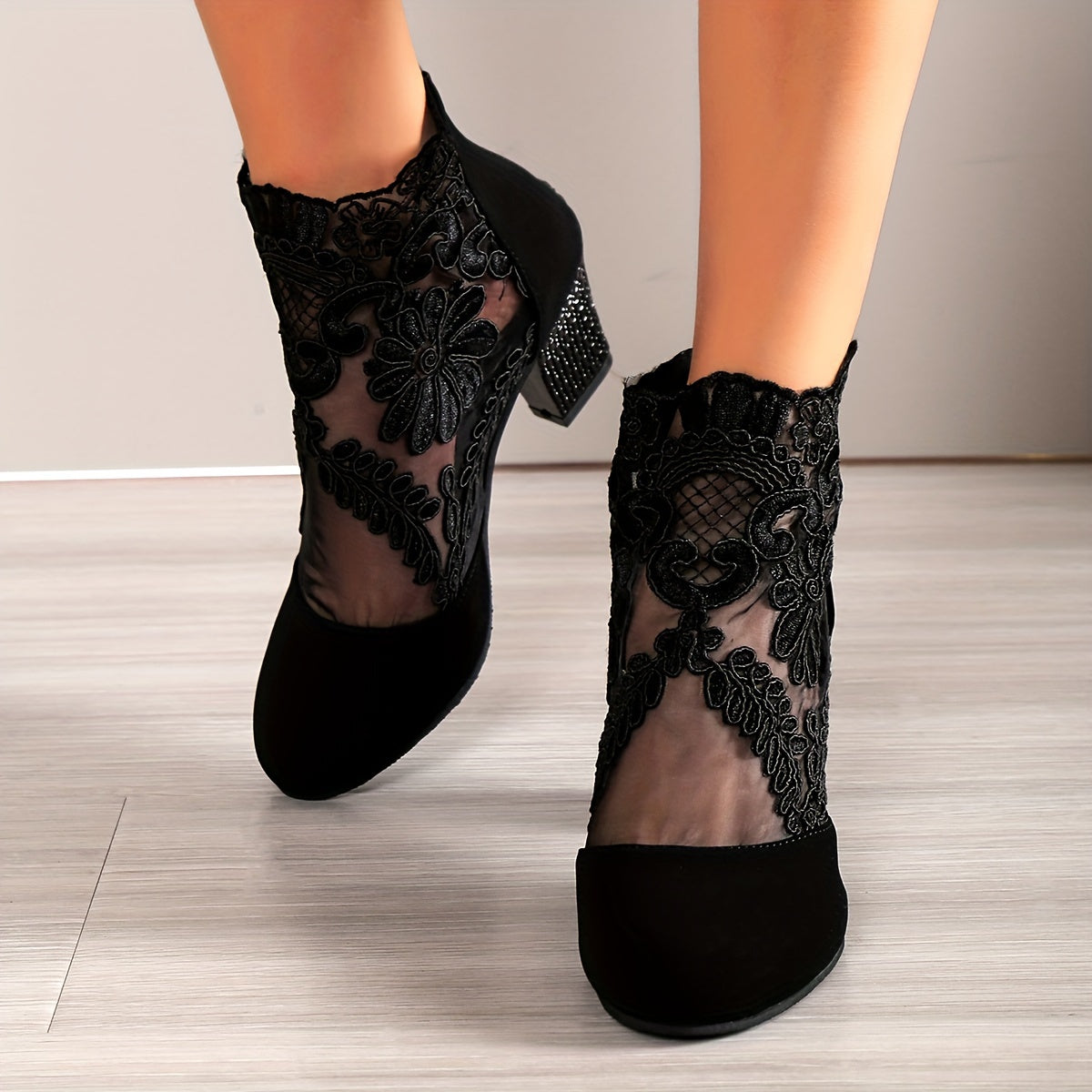 Elegant mesh boots for women with chunky heel and back zipper, round toe for comfort and breathability.