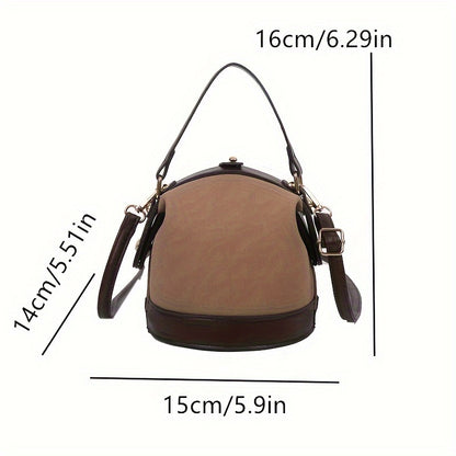 Fashionable women's bucket bag in two-tone brown and beige with gold hardware, ideal for travel and everyday use. Modern tote bag option.