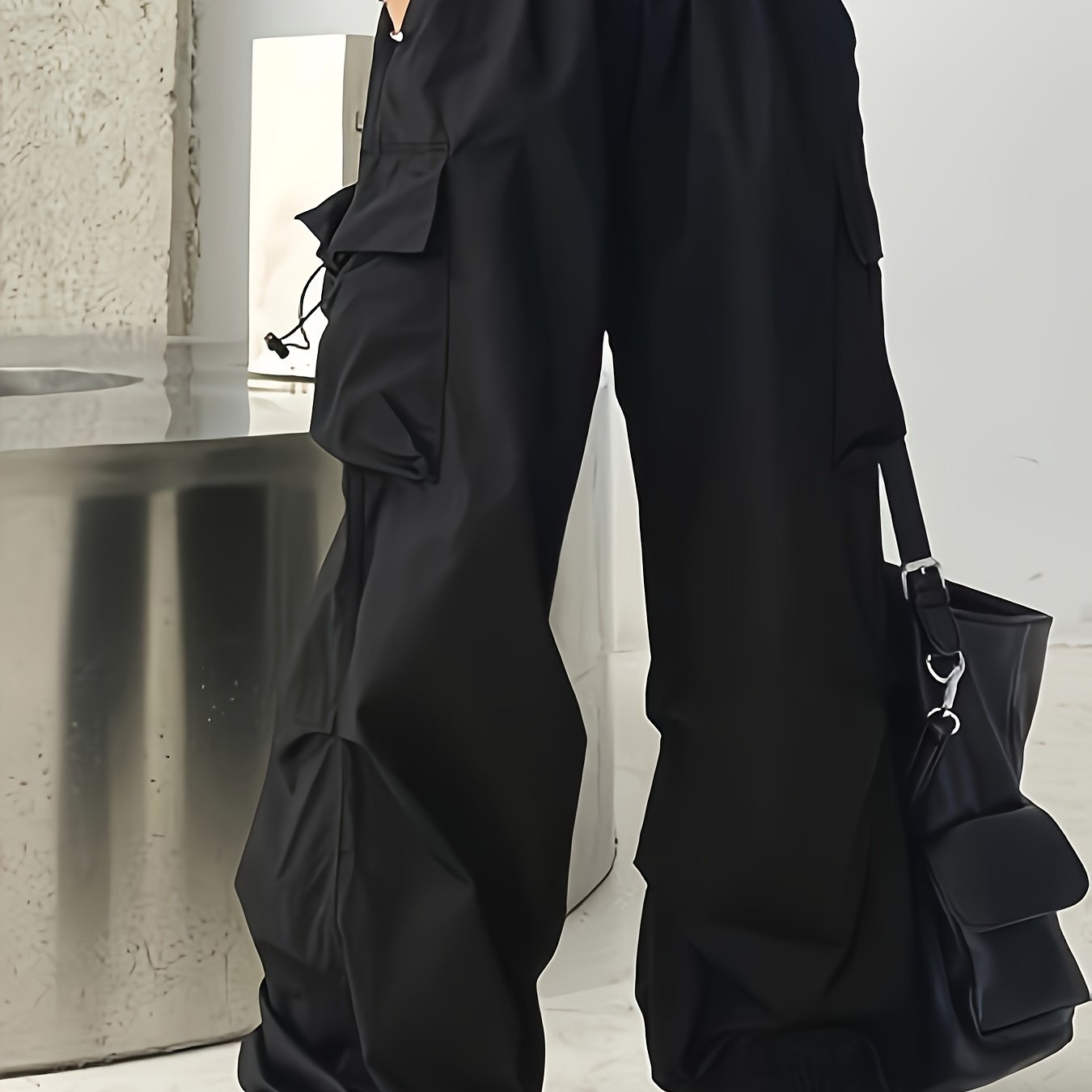 Wide leg cargo pants with flap pockets, drawstring closure. Perfect for spring and summer. Women's casual clothing.