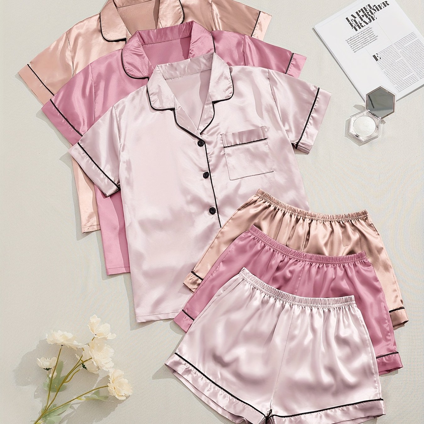 Women's Satin Pajama Set includes short-sleeve top and elastic waistband shorts for sleepwear and loungewear.