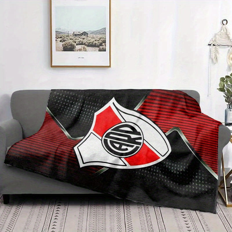 Stay cozy with a River Plate inspired printed fleece blanket. This soft and warm blanket is perfect for sofas, beds, and camping trips. It is machine washable and suitable for all seasons, making it a versatile gift for home and travel.