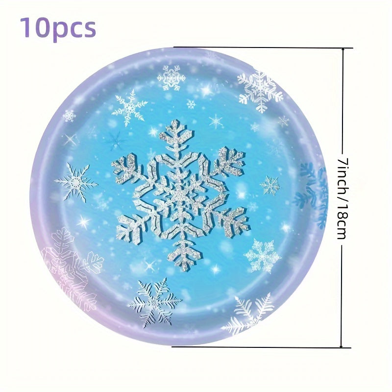 Frozen themed party tableware for 10 guests, including snowflake plates, cups, napkins, and dinnerware set. Perfect for a holiday birthday party or Christmas winter wonderland celebration. Ideal for Frozen birthday party decorations.