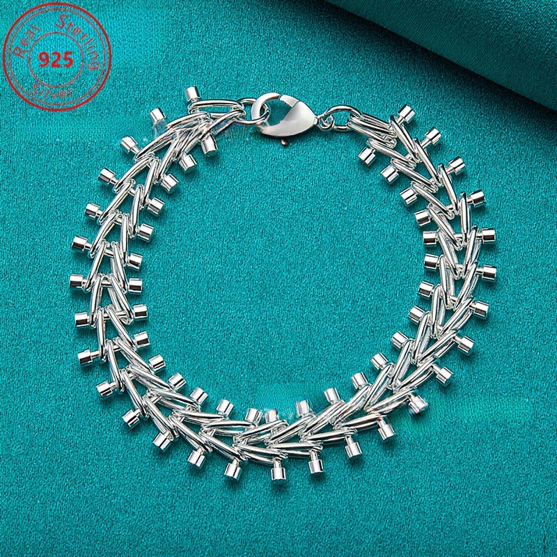 This bracelet is made of high-quality S925 sterling silver featuring a double bead chain design. It is beautifully crafted with exquisite silver detailing, embodying a fashionable retro style. This versatile piece is perfect for everyday wear or special