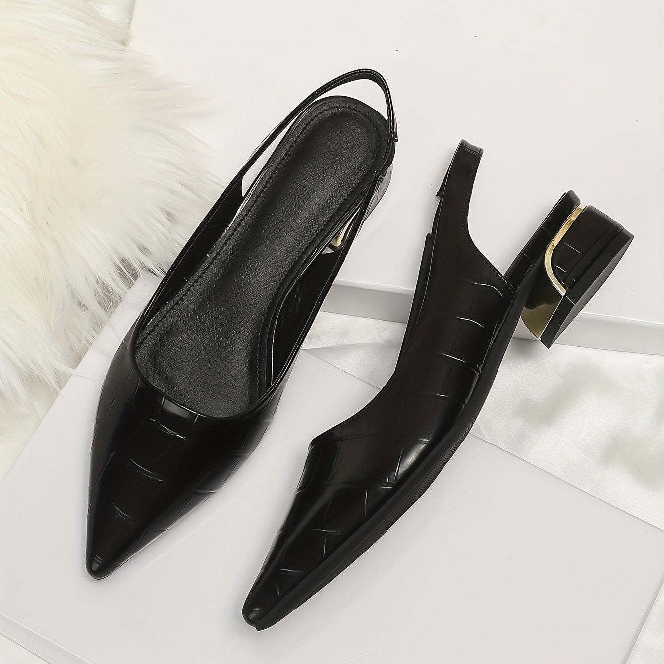 Low heel slingback shoes with pointed toe and elastic strap, suitable for work office.