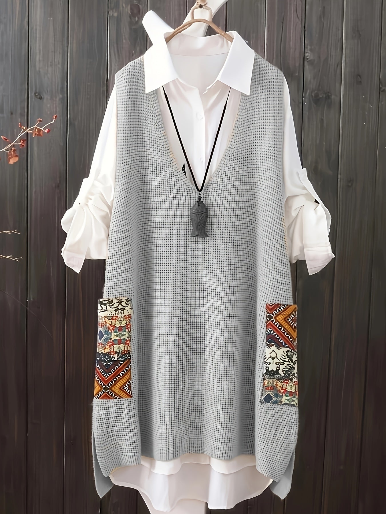 Plus size casual V-neck printed sweater vest dress with pockets.