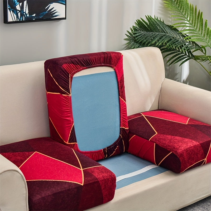 Stretch sofa slipcover with geometric red and blue print, elastic band for easy fit, machine washable, modern home decor accessory for 1 to 4-seater sofas. Made of soft silky fiber fabric with spandex polyester blend for furniture enhancement.