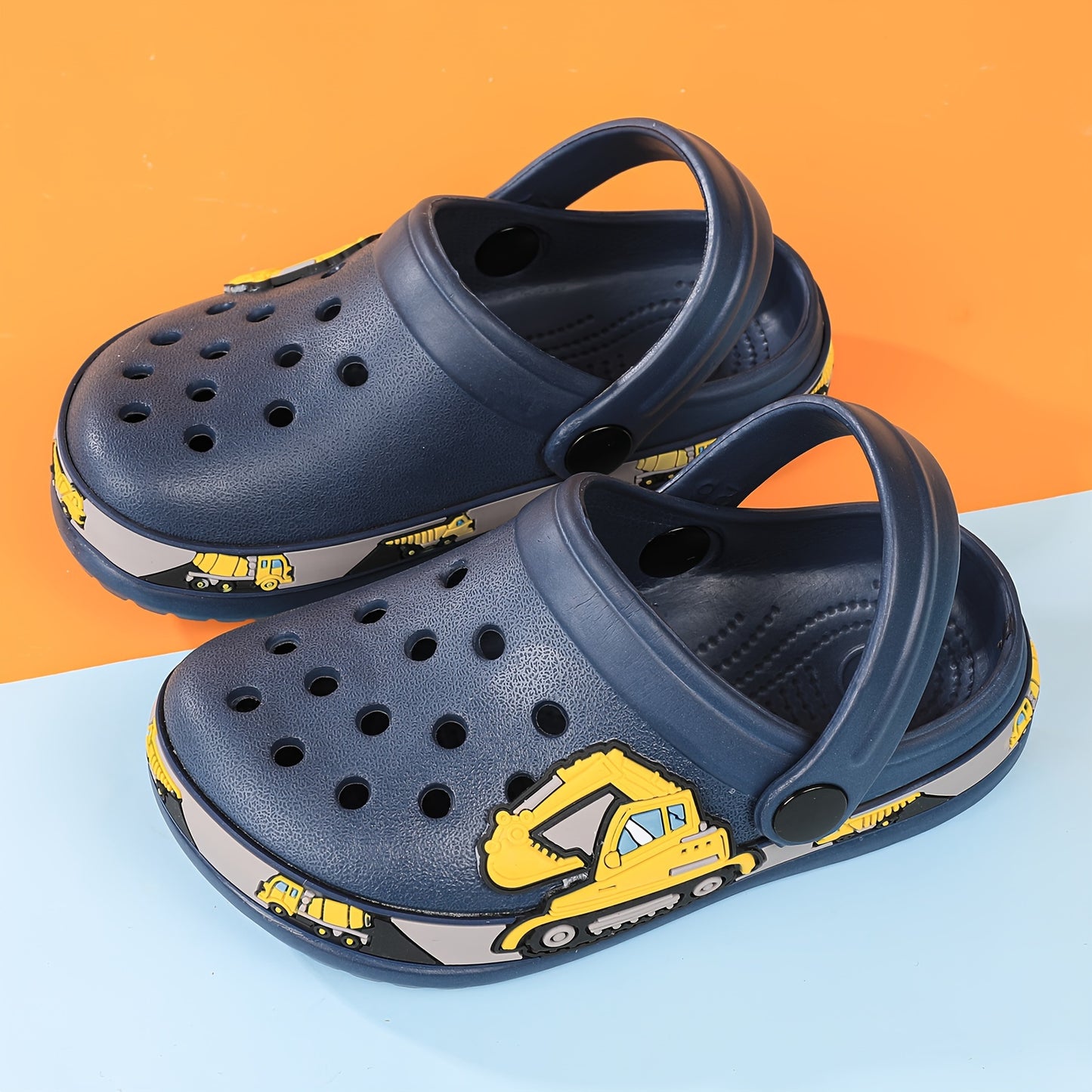 Toddler girls' cartoon print platform clogs with closed toe, anti-skid soles, and hollow out design – perfect for outdoor play.